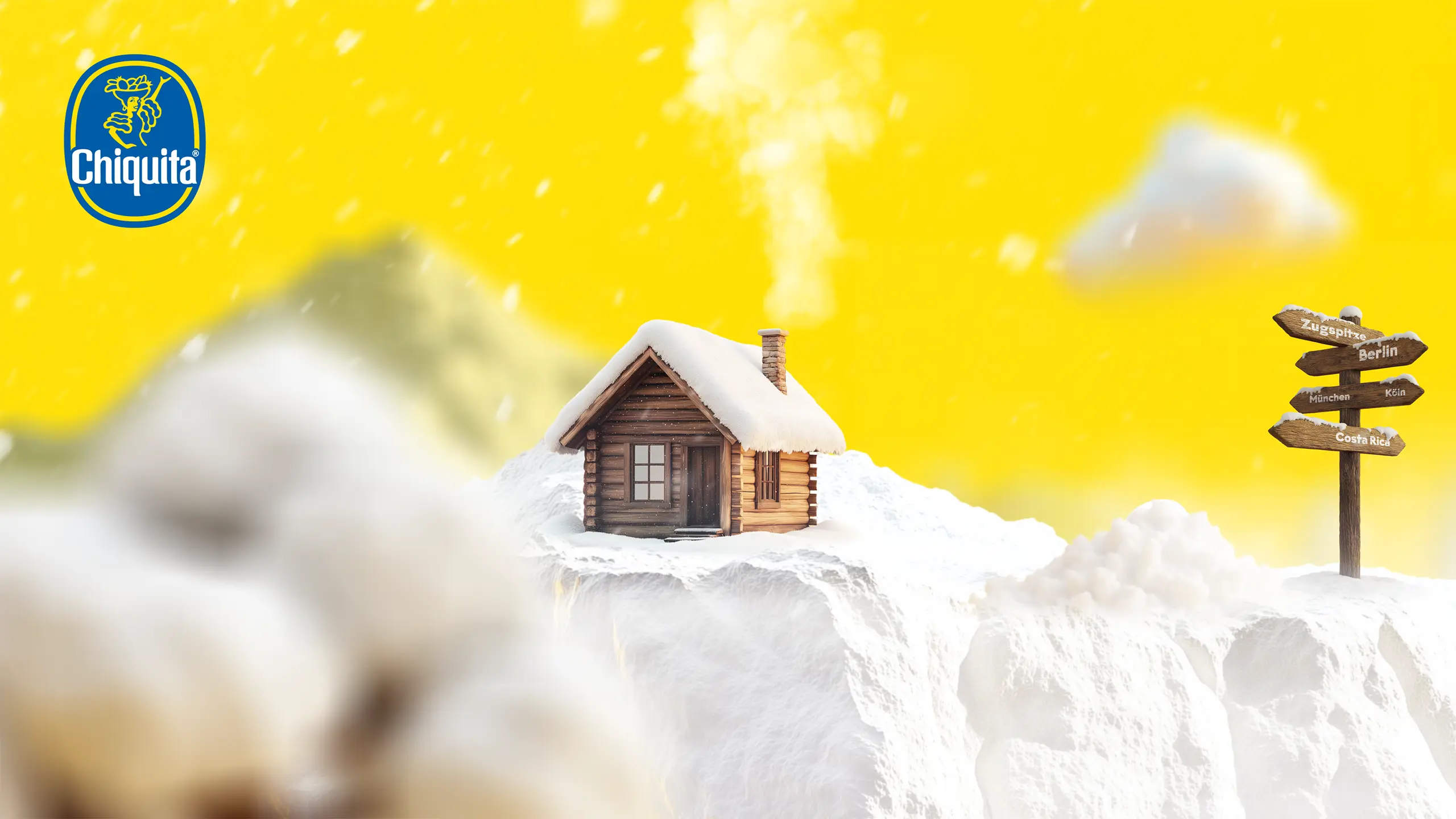 Chiquita Weihnachtsfilm mit KI-generierter Schneelandschaft und Berghütte